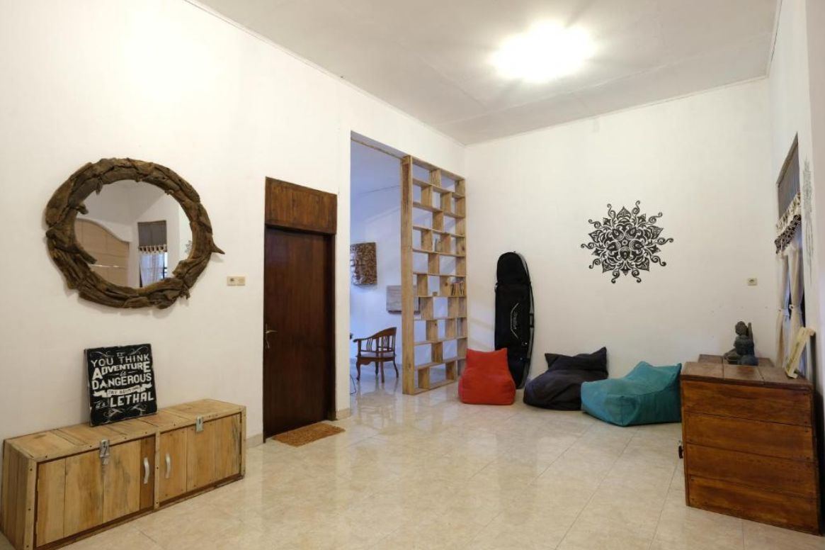 Indoor lounge with beanbags and mandala wall art